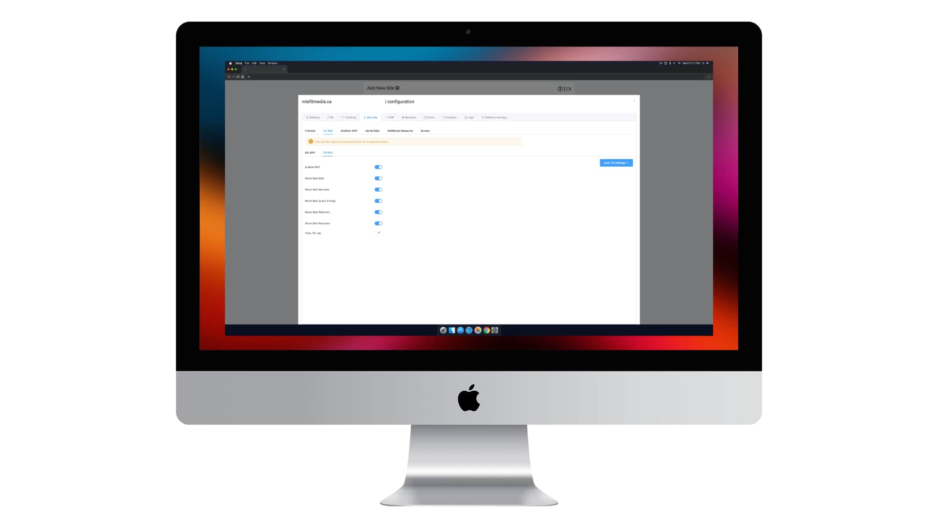 Apple iMac with a Kelowna web hosting companies web hosting security dash board open.